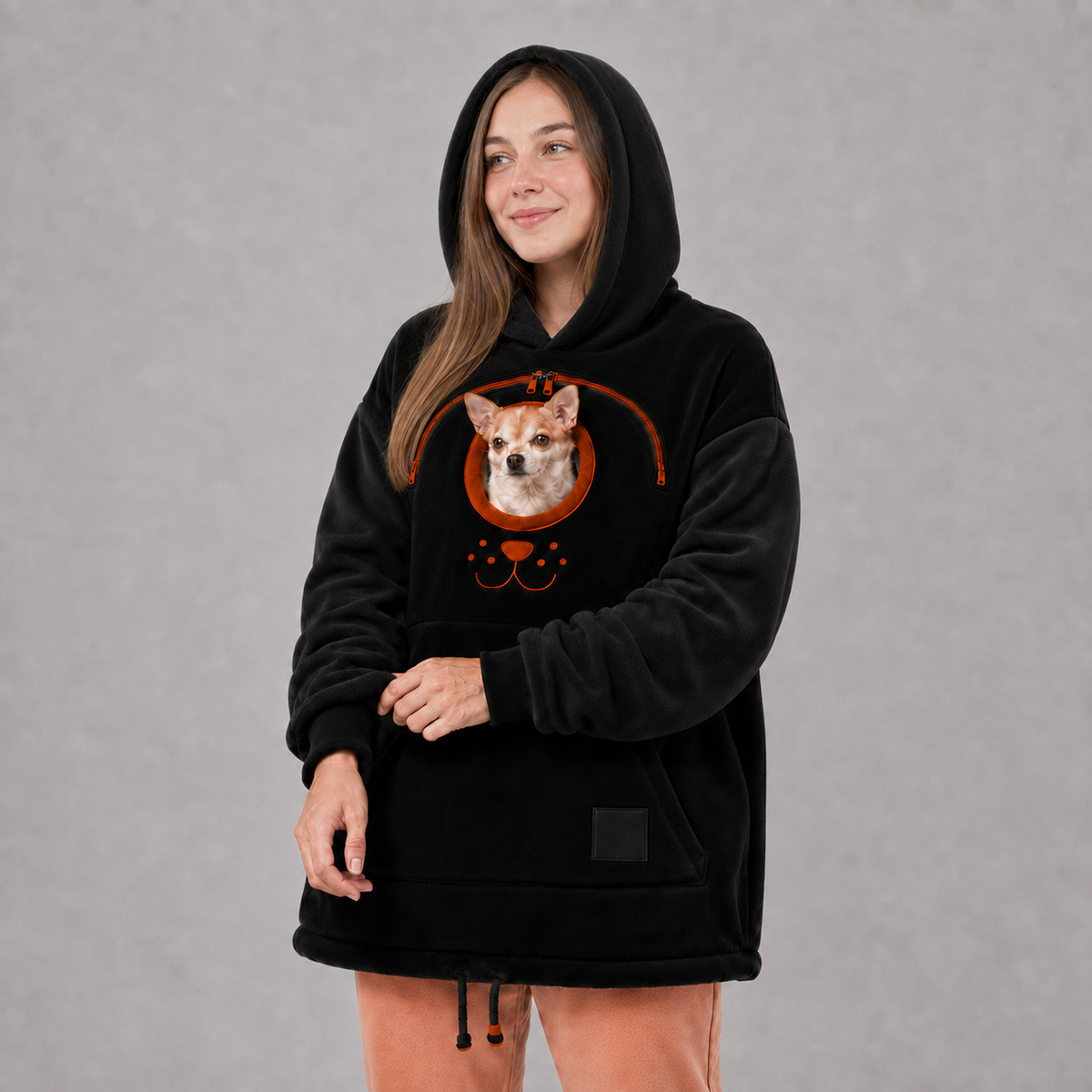 Black Pet Carrier Hoodie with a small dog in the front pouch