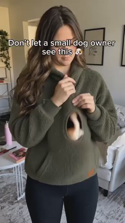 Demonstration of a small pet inside the hoodie pouch